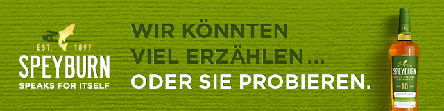 das Foto, eine Werbeanzeige, zeigt Text und eine Flasche Speyburn Whisky auf grünem Grund