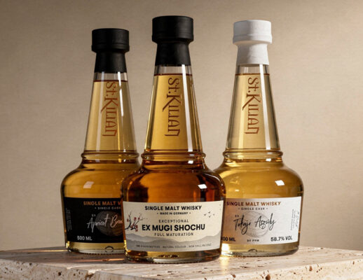 St. Kilian Neuheiten das Foto zeigt die Flaschen dreier neuer Whiskys der St. Kilian Distillers auf einer Steinplatte