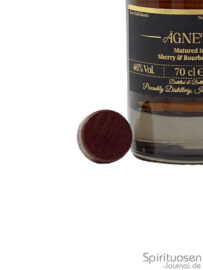 der Verschluss einer Flasche Indri Agneya