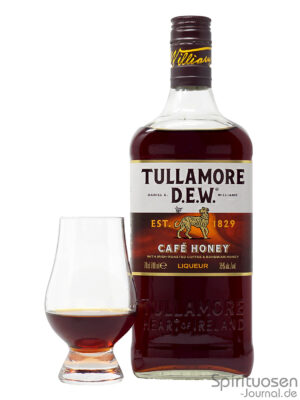 Tullamore D.E.W. Café Honey eine Flasche Tullamore D.E.W. Café Honey nebst Glas